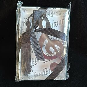 Bookmark NIB silvertone treble clef w/ black tassel. In musical staff decor box
